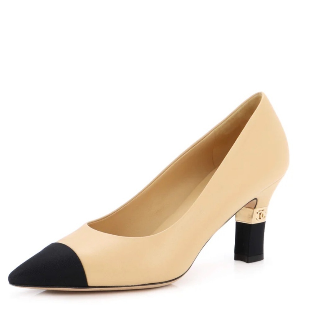 Chanel- Authentic Beige and Black Pointed Cap Toe CC Heel Leather Pumps